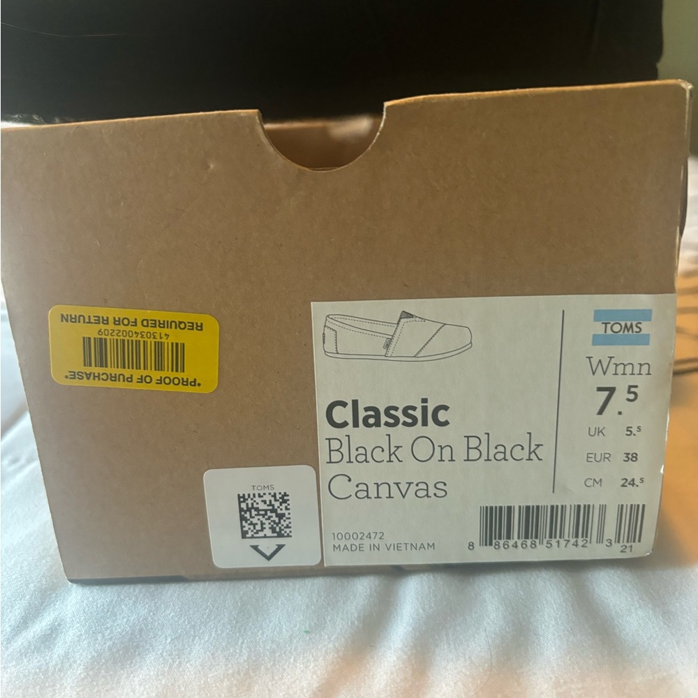 Tom’s Classic black on black canvas shoes 7.5 women’s
